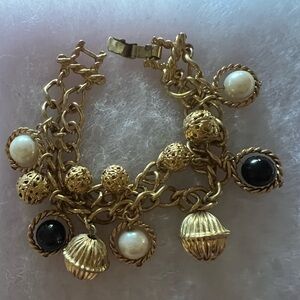 Elegant Goldtone, Black and Pearl Charm Bracelet